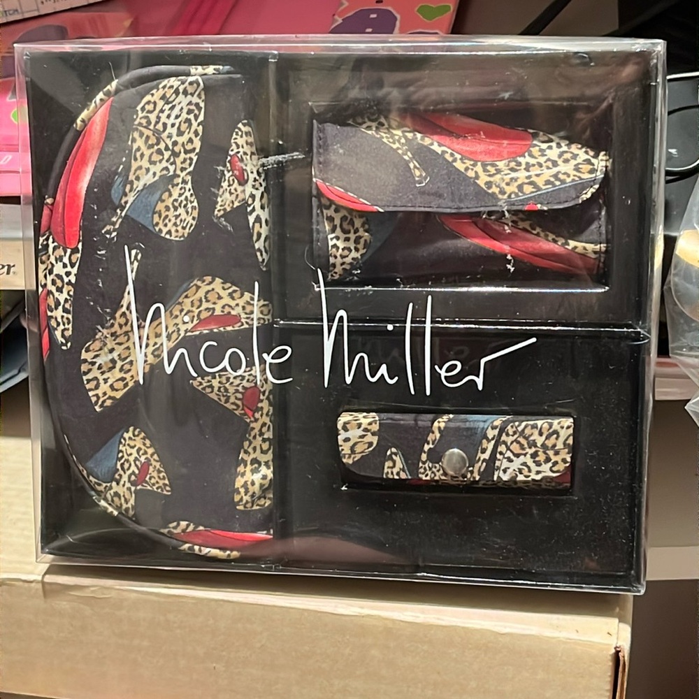 Stunning Trio by Nicole Miller, in original box.